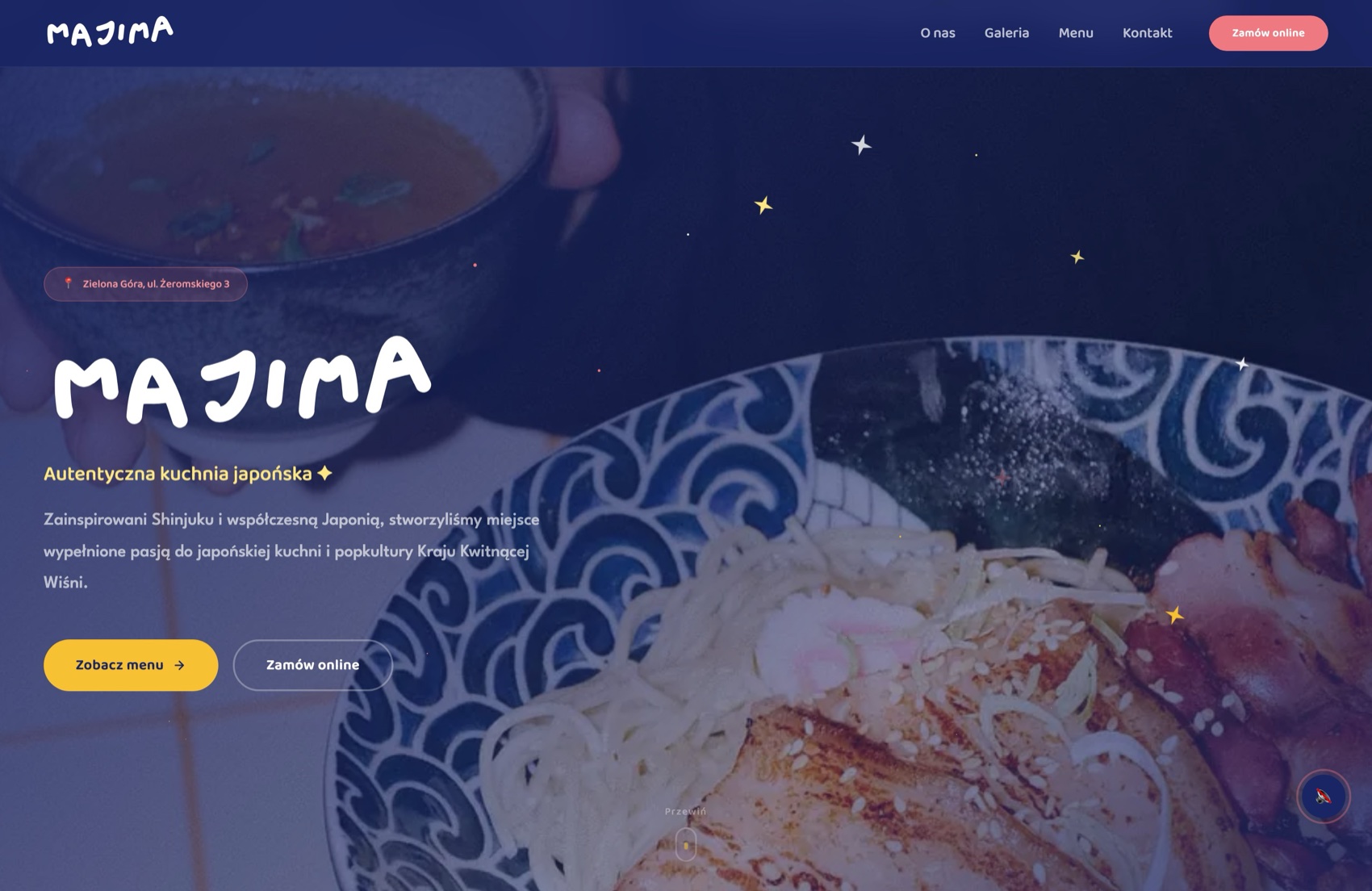 Majima Restaurant website shown on a MacBook screen